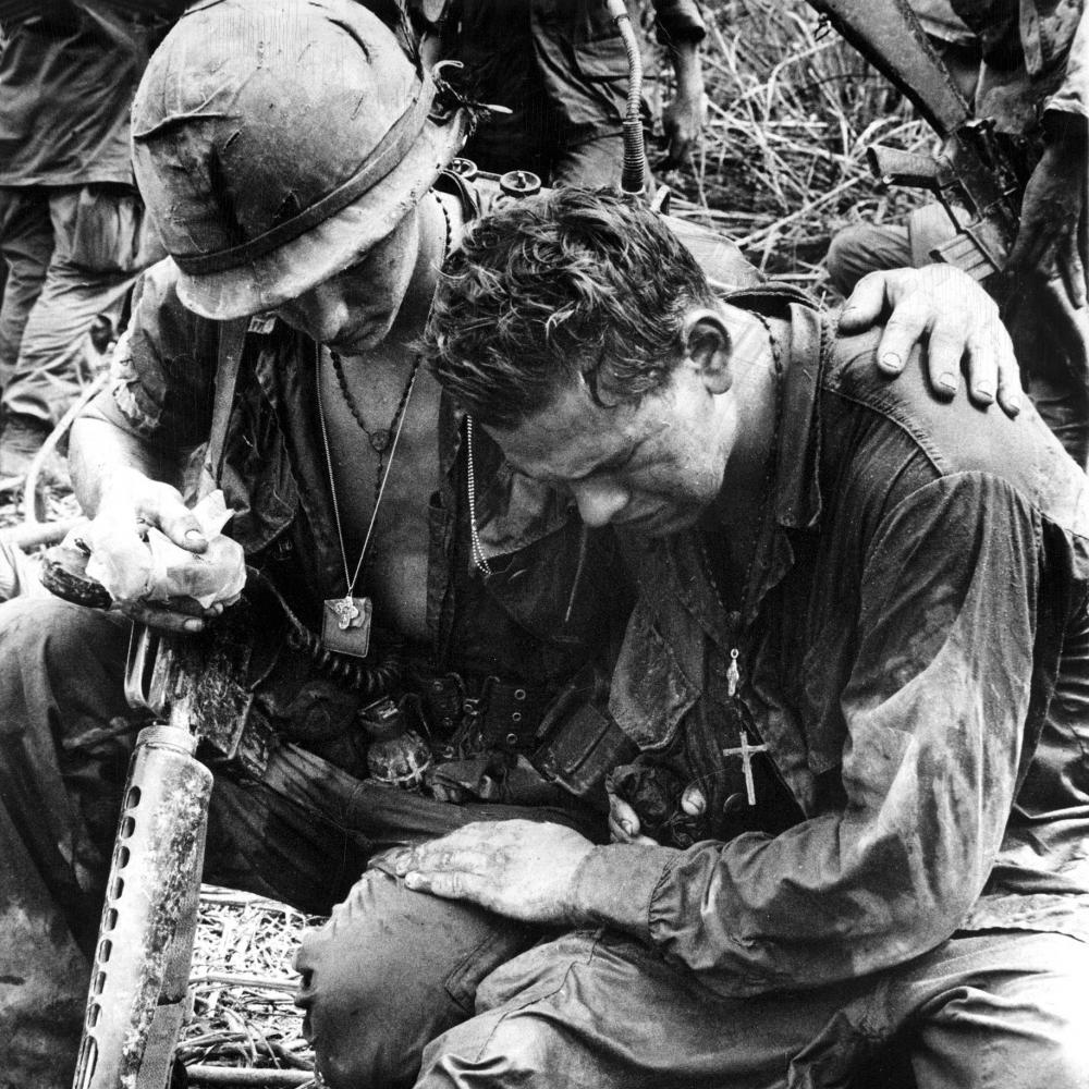 Black and white photograph of two American soldiers in Pleiku, South Vietnam