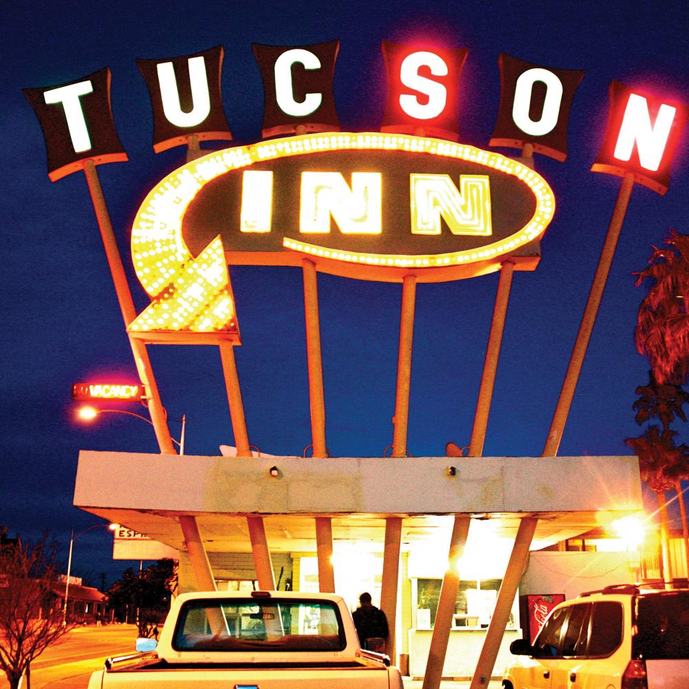 Photograph of neon sign reading "Tucson Inn"