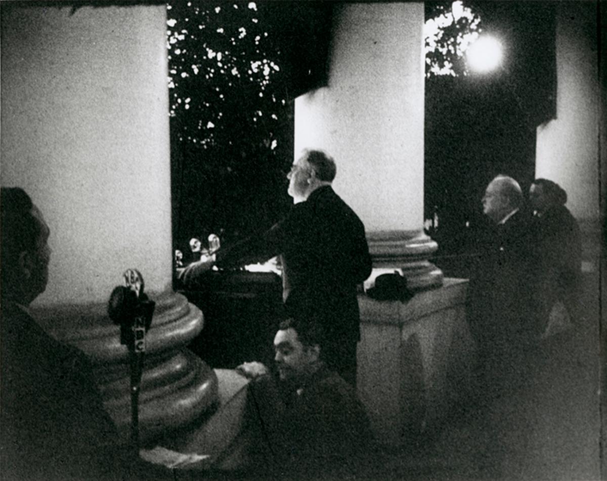Churchill looks on as Roosevelt delivers his remarks at the Christmas tree lighting on December 24, 1941