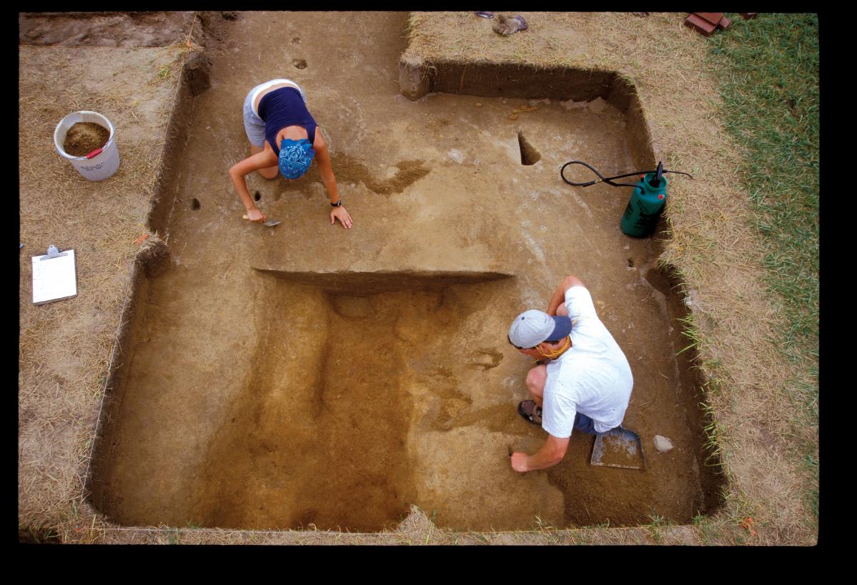 bird's eye view photo of two people working at a dig site