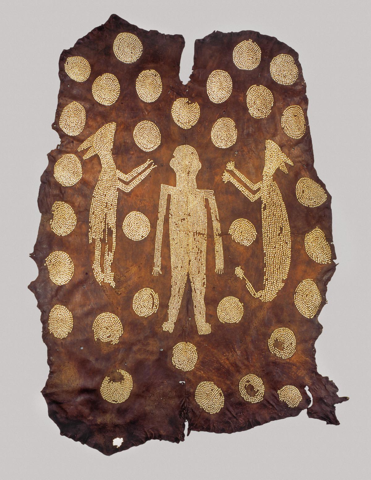 deerskin with a man carved into it