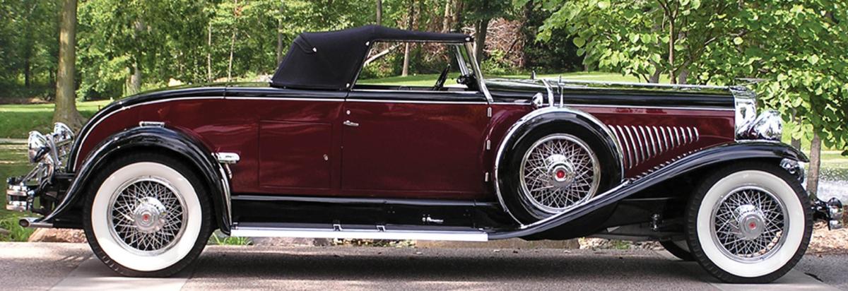 Maroon convertible, with black and white trim