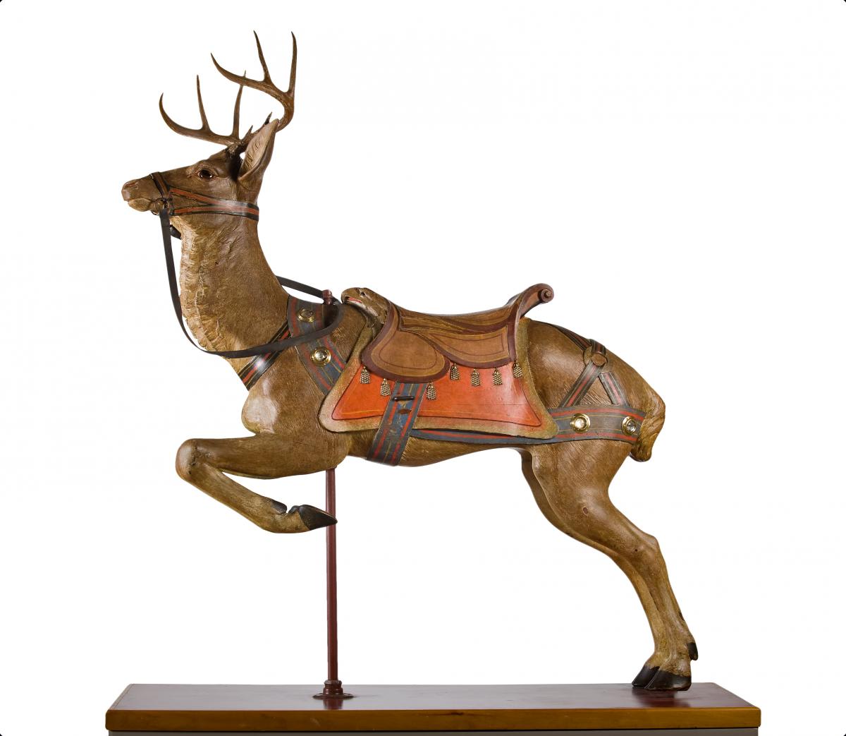 Photograph of a wooden carved deer