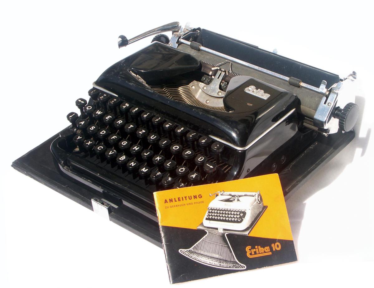 Black typewriter with silver furnishings