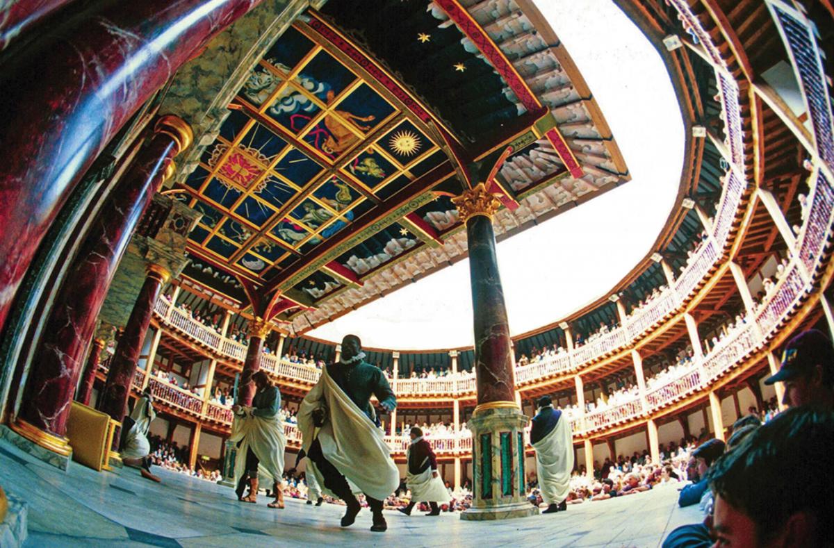 Ground view looking up, on-stage at shakespeare's globe, showing the painted ceilings and columns