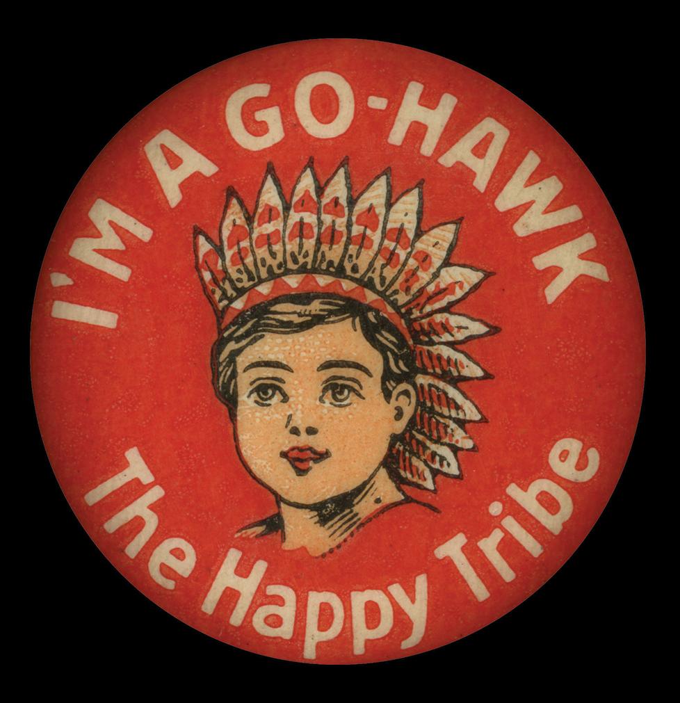 Image of a "Go-Hawk" pin in red, with an illustration of an Indian women in the center and the words, "The Happy Tribe" underneath her.