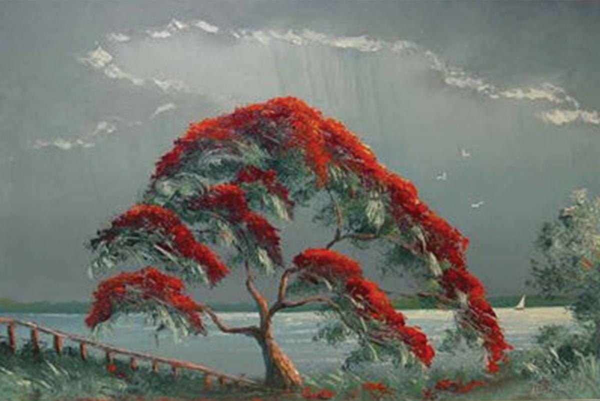 A flowering tree with red flowers, next to a body of water, cloudy sky