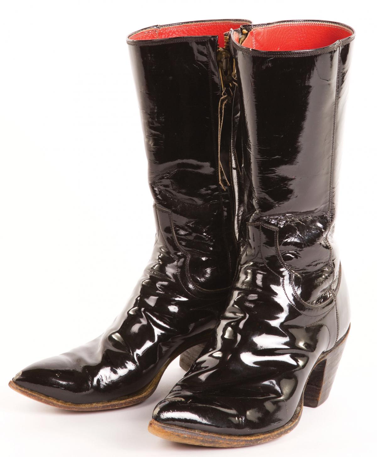 Phillips’s trademark patent leather boots