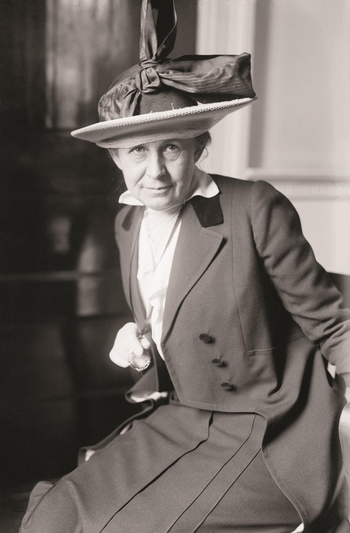 Black and white photograph of a woman in a hat