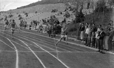 black and white photo of a track meet