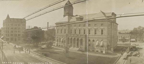 Postcard showing Rockingham County courthouse and surrounding buildings in Harrisonburg, Virginia.