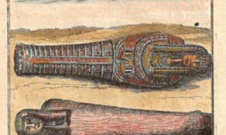 Color picture of two mummies laying side-by-side, head to toe.