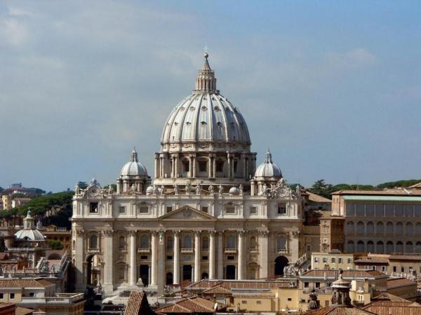 the white dome of St. Peter's Basilica