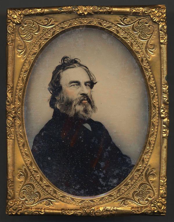 A portrait of Longfellow towards the end of his life, with beard.