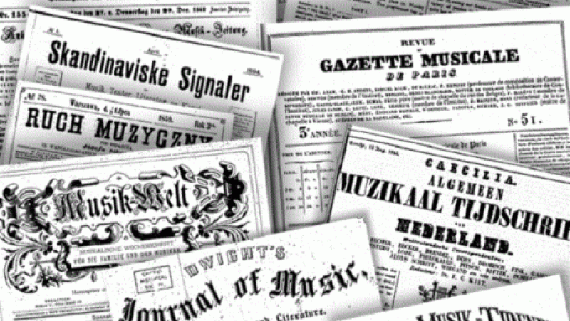 Photo of a collection of newspapers from various countries, in various languages.