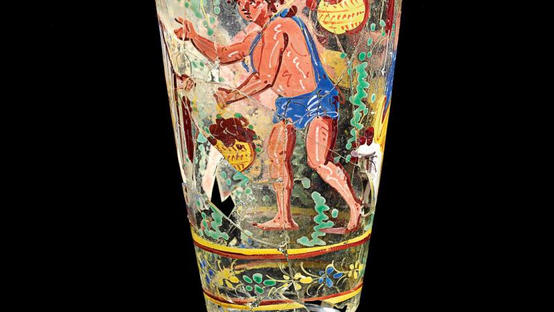 antique goblet with human figure painted on it