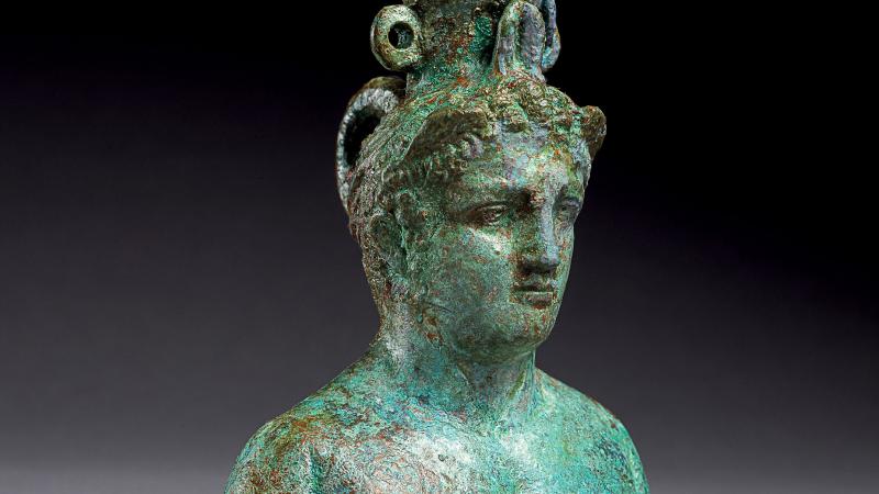 bronze rusted bust of a woman 