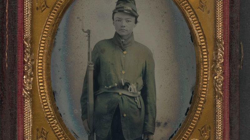 Framed black and white photo of a Union Soldier, duly outfitted.
