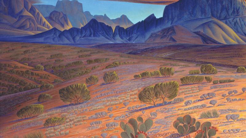 Desert landscape in warm tones, with the distant blue mountain range made into the profile of a man