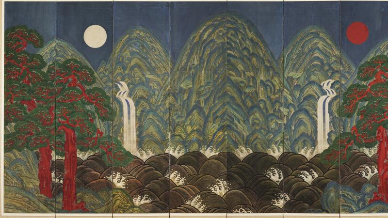 Screen painted with mountains, trees, the moon, and a flowing waterfall