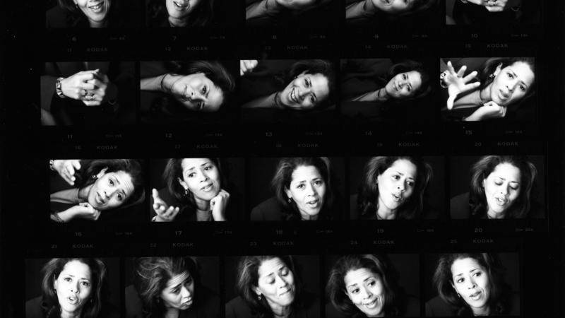 Repeated headshots of Anna Deavere Smith laid out on a black background in artistic fashion.