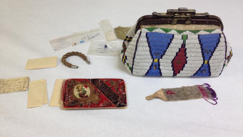 From the Hazel McGaa-Cuney Collection. The beaded bag and items within belonged to her mother.