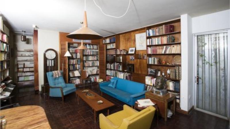 photograph of a library with couches