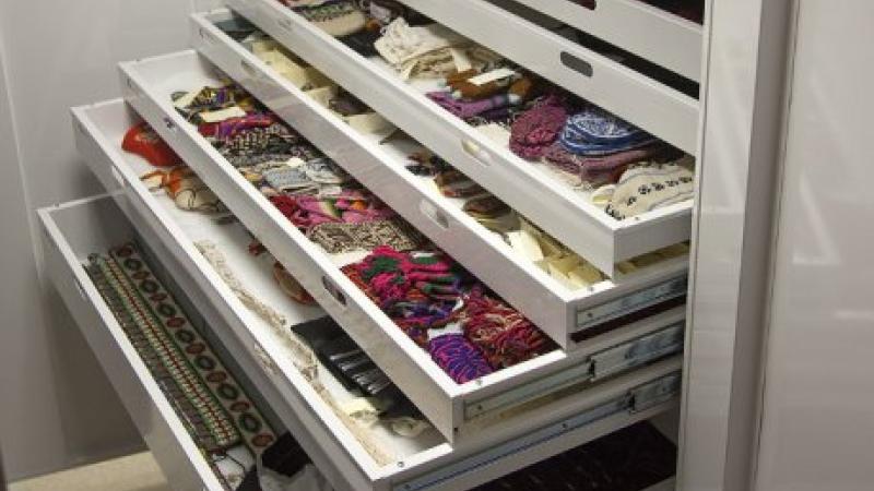 photo of open drawers with fabric inside