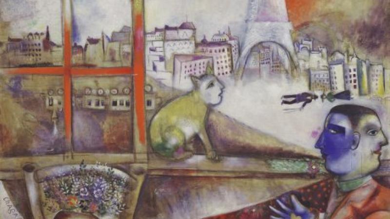 Colorful painting by Marc Chagall showing the Eiffel Tower and a Parisian cityscape in the background.