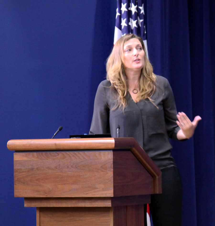Michelle Kaufmann, architect and designer, at White House podium, photo