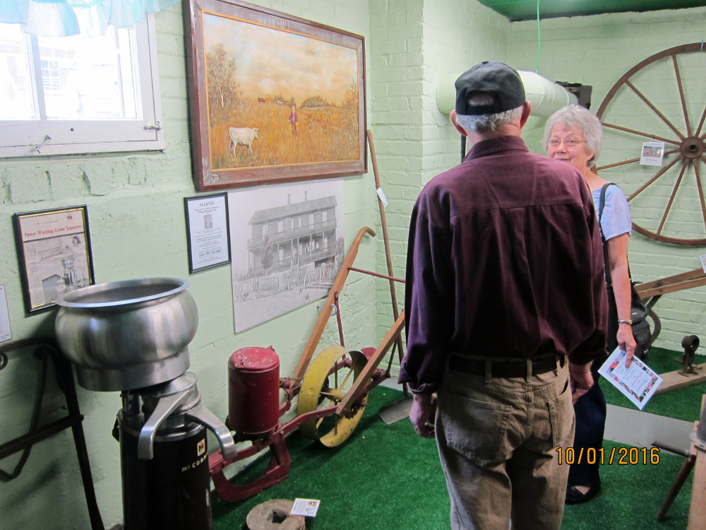 Visitors in newly opened Farm Room on the lower level.