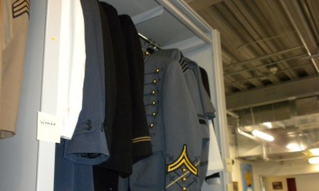 Uniform storage area in the collections room.