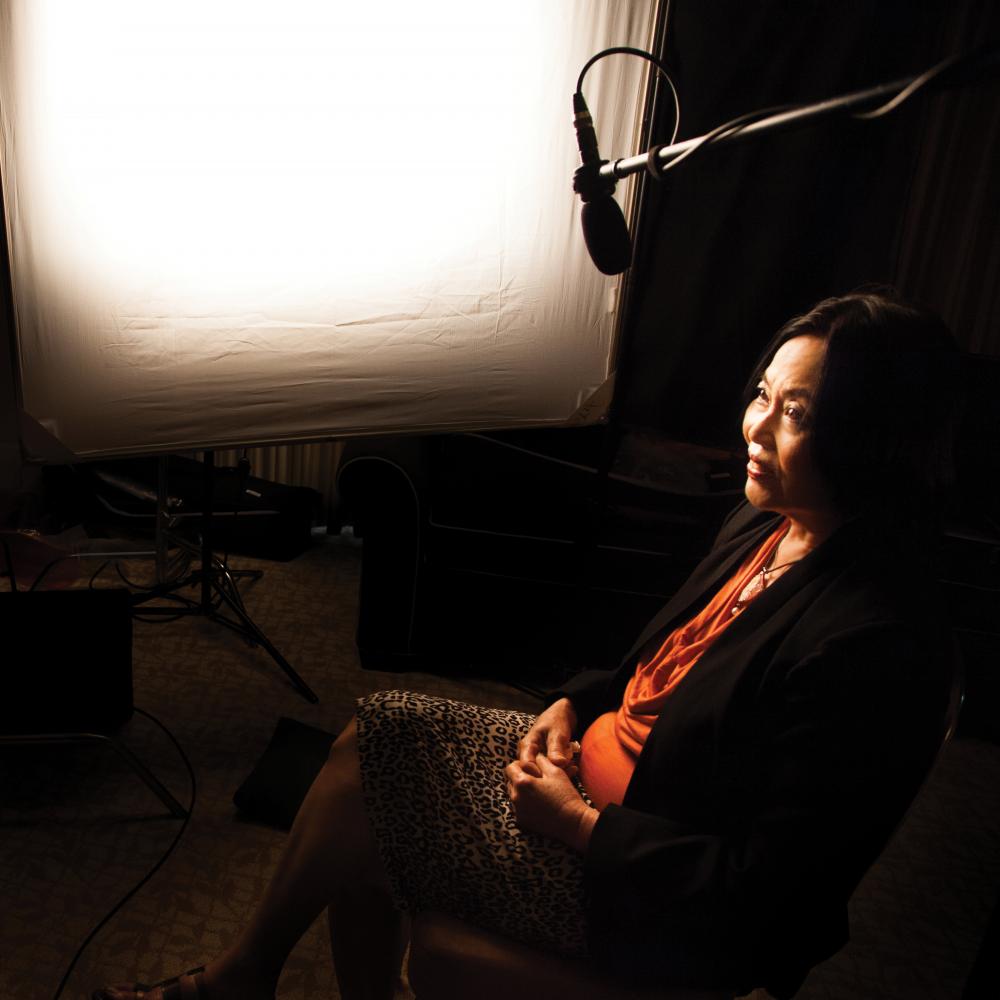 Lynn Novick interviewing Duong Van Mai Elliott in a darkened room