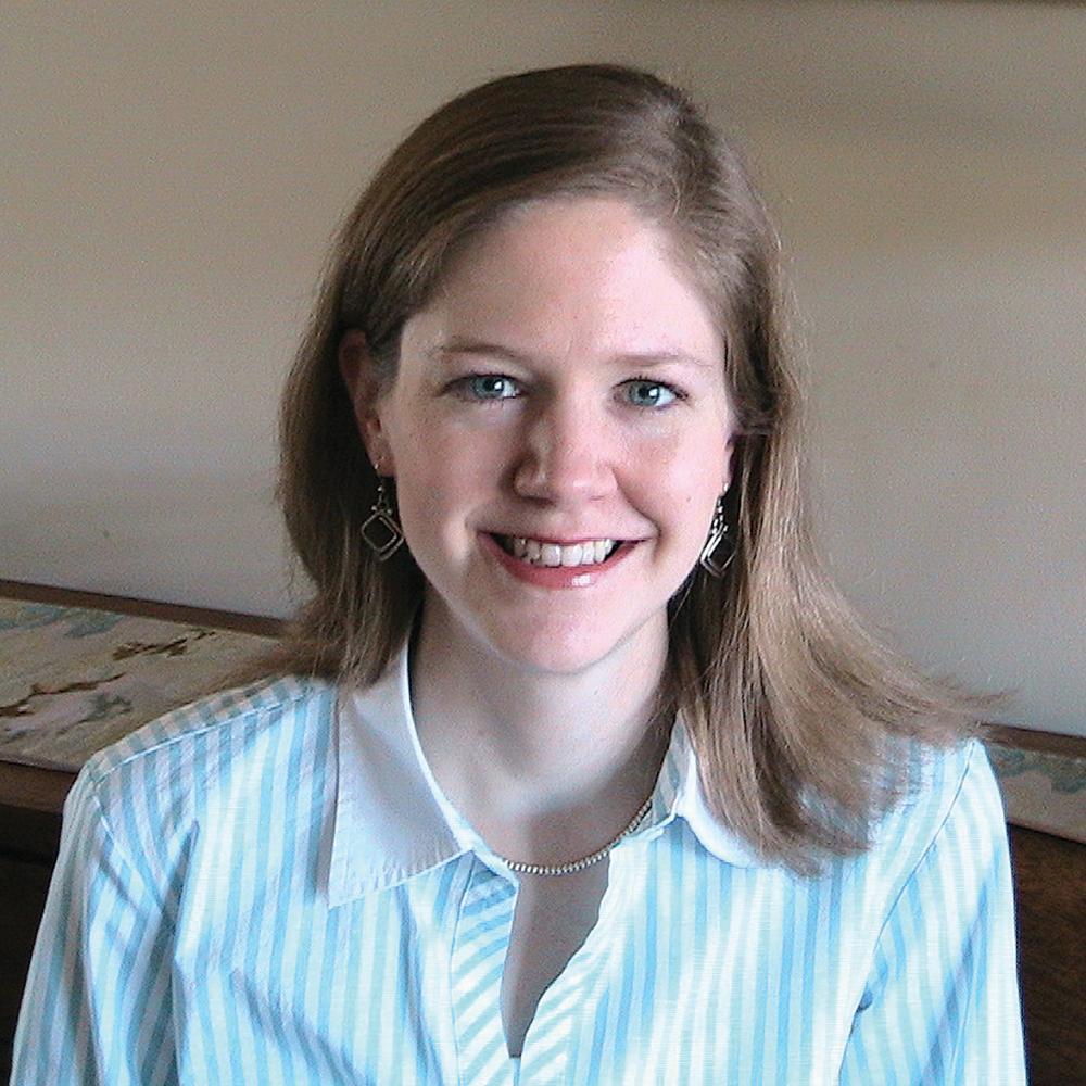 Photograph of woman in a blue shirt