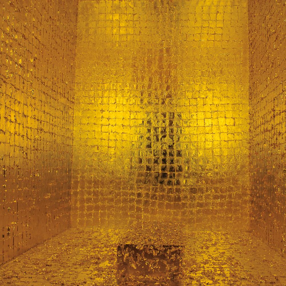 Shimmering gold square tiles panel a room