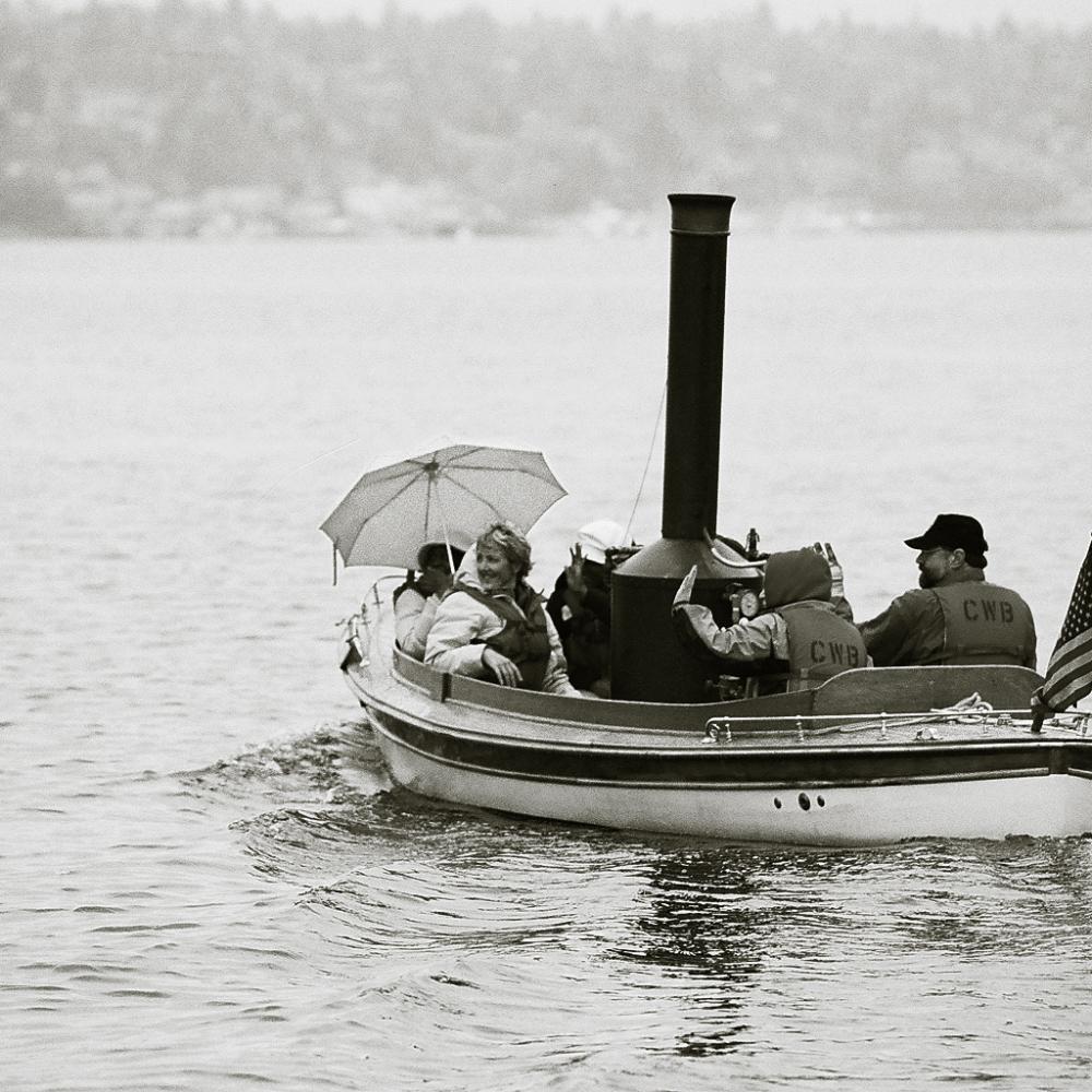 Photograph of a small wooden boat in the water