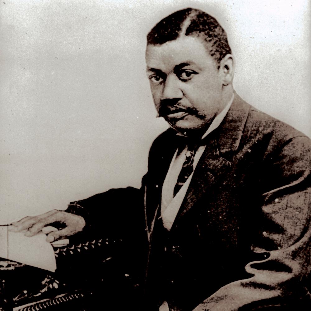 Portrait of African American man at desk