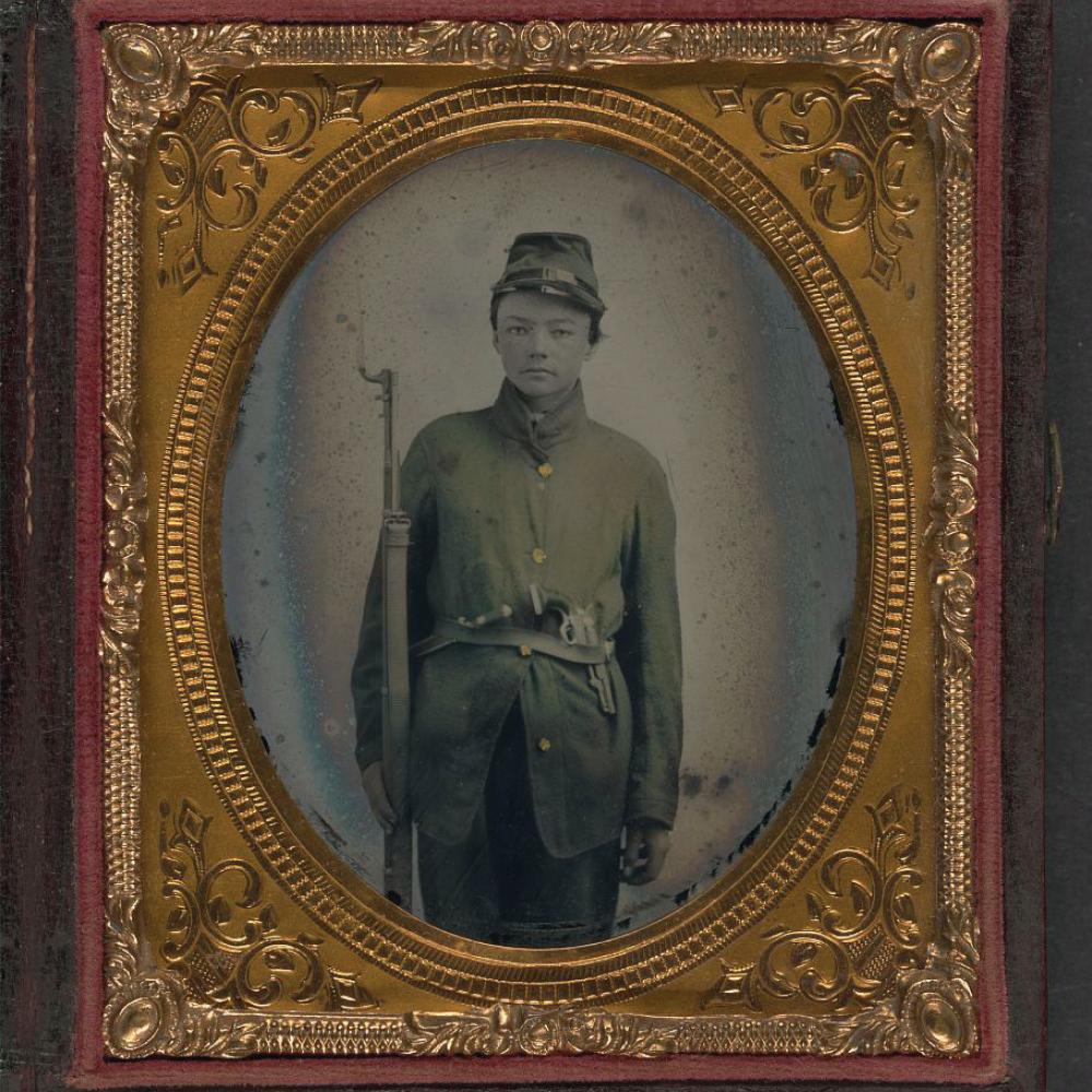 Framed black and white photo of a Union Soldier, duly outfitted.