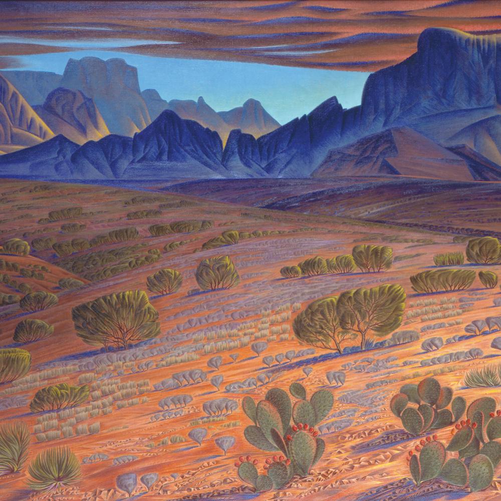 Desert landscape in warm tones, with the distant blue mountain range made into the profile of a man