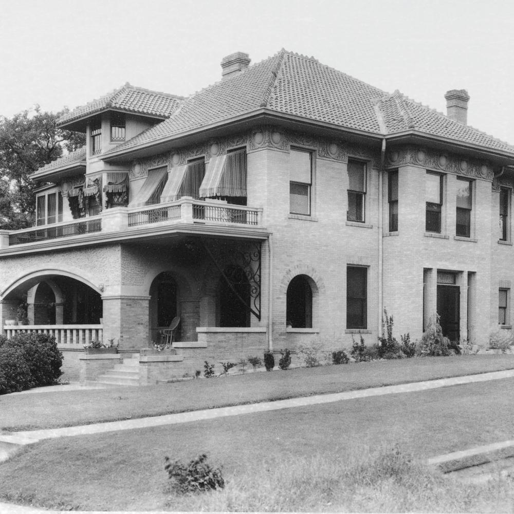 Black and white photo of the Reed family home