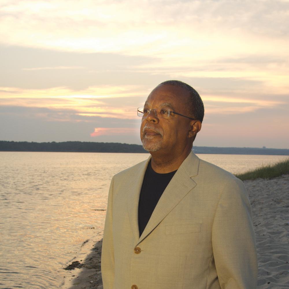 Photograph of Henry Louis Gates Jr. on a beach