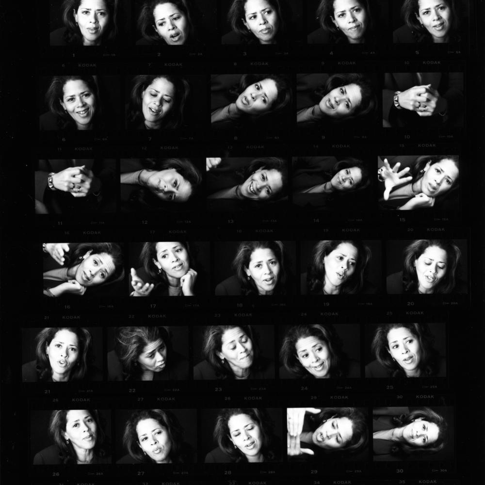 Repeated headshots of Anna Deavere Smith laid out on a black background in artistic fashion.