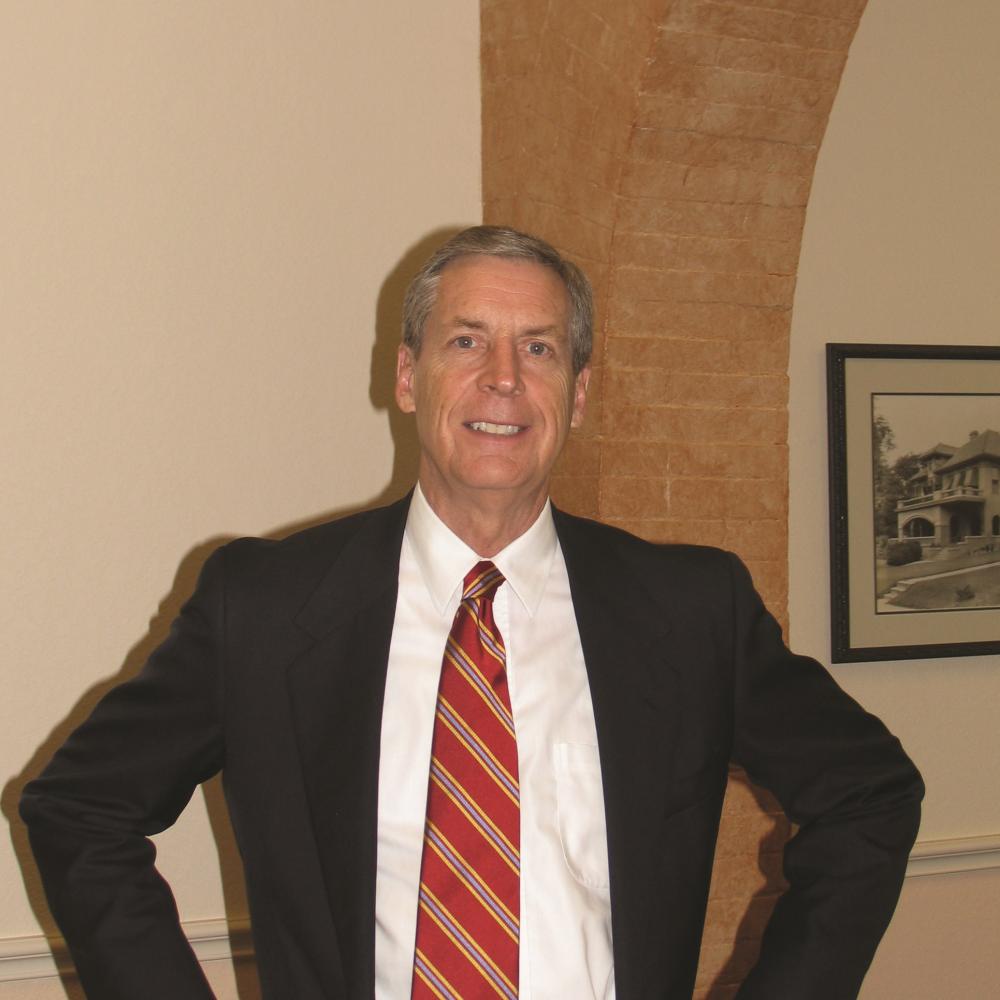 Photograph of man in suit and tie