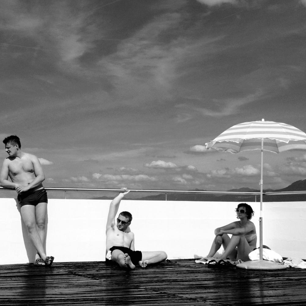 Three people at the pool