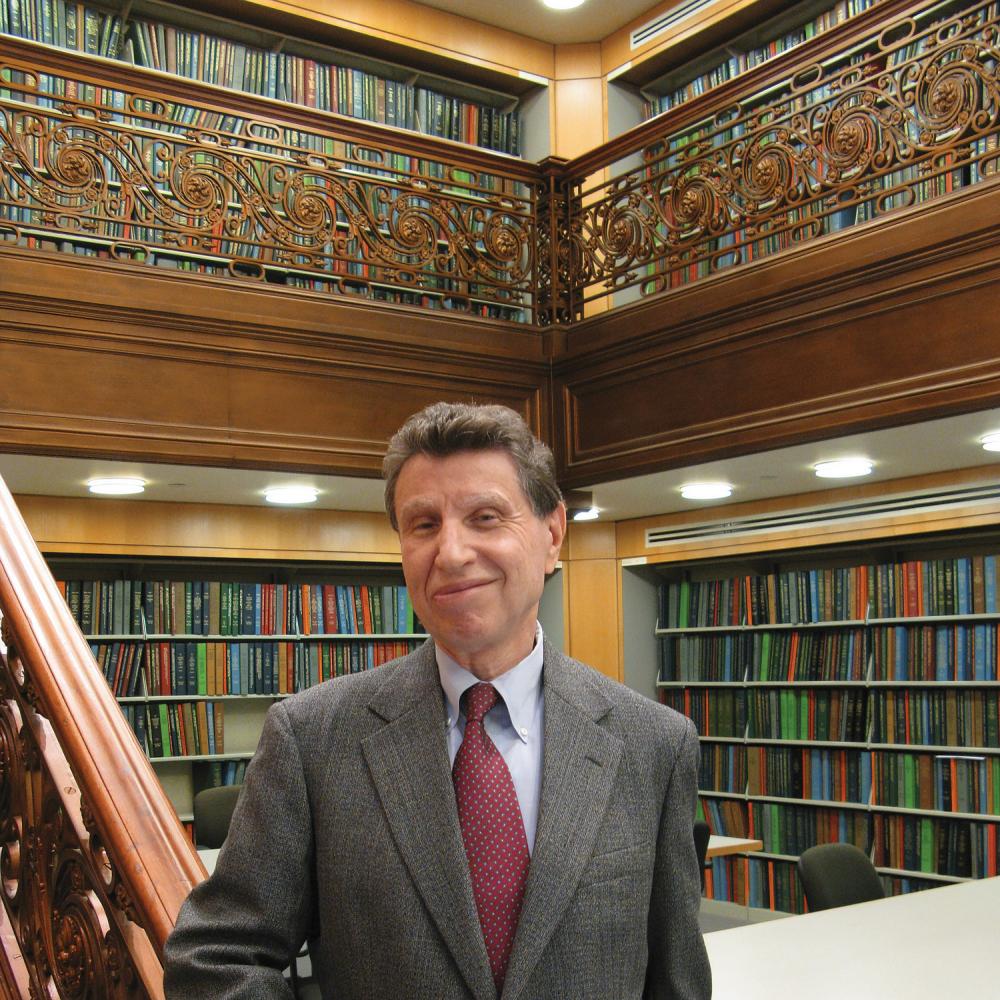 Morris Dickstein, photographed in suit and tie for Humanities magazine.
