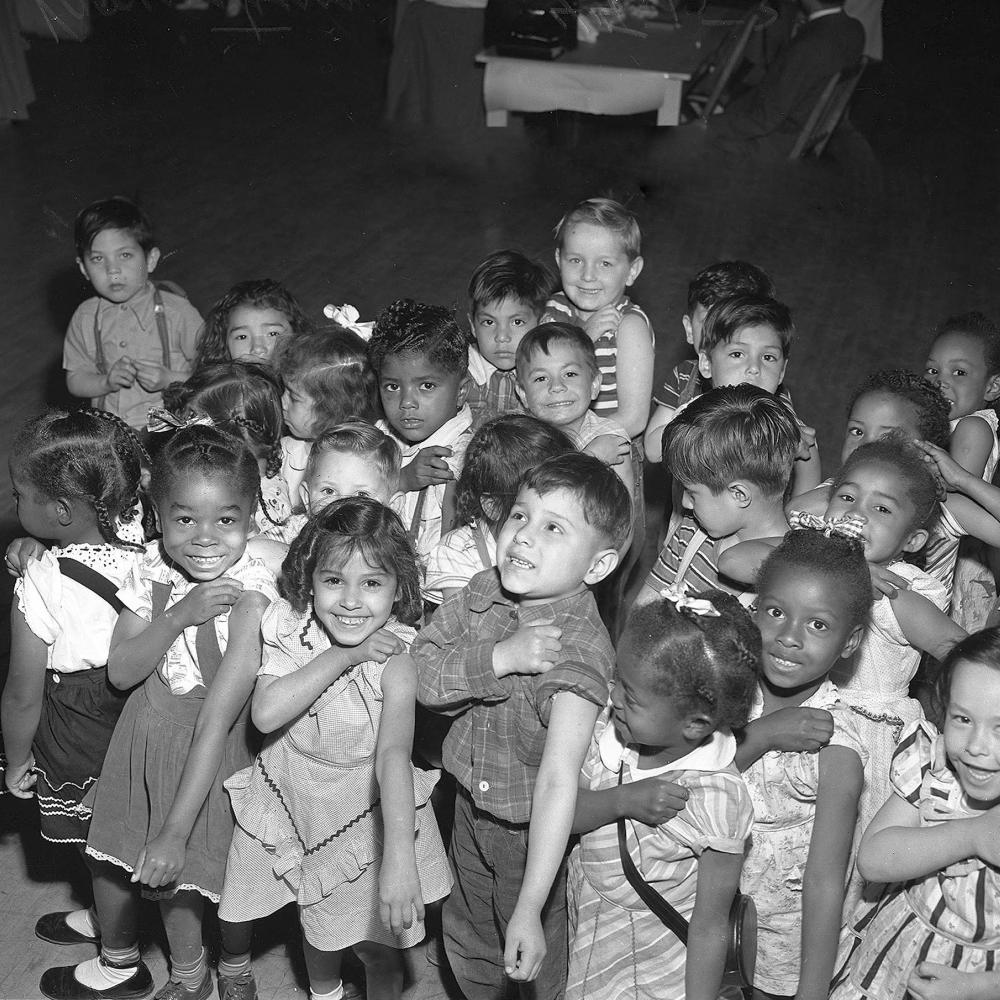 Children showing smallpox vaccinations in 1949. 
