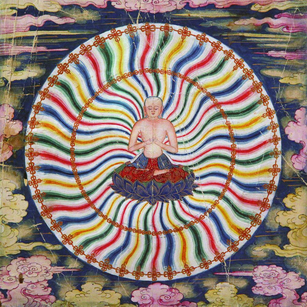 Painting of a meditating Buddha in the center of a colorful wheel. 
