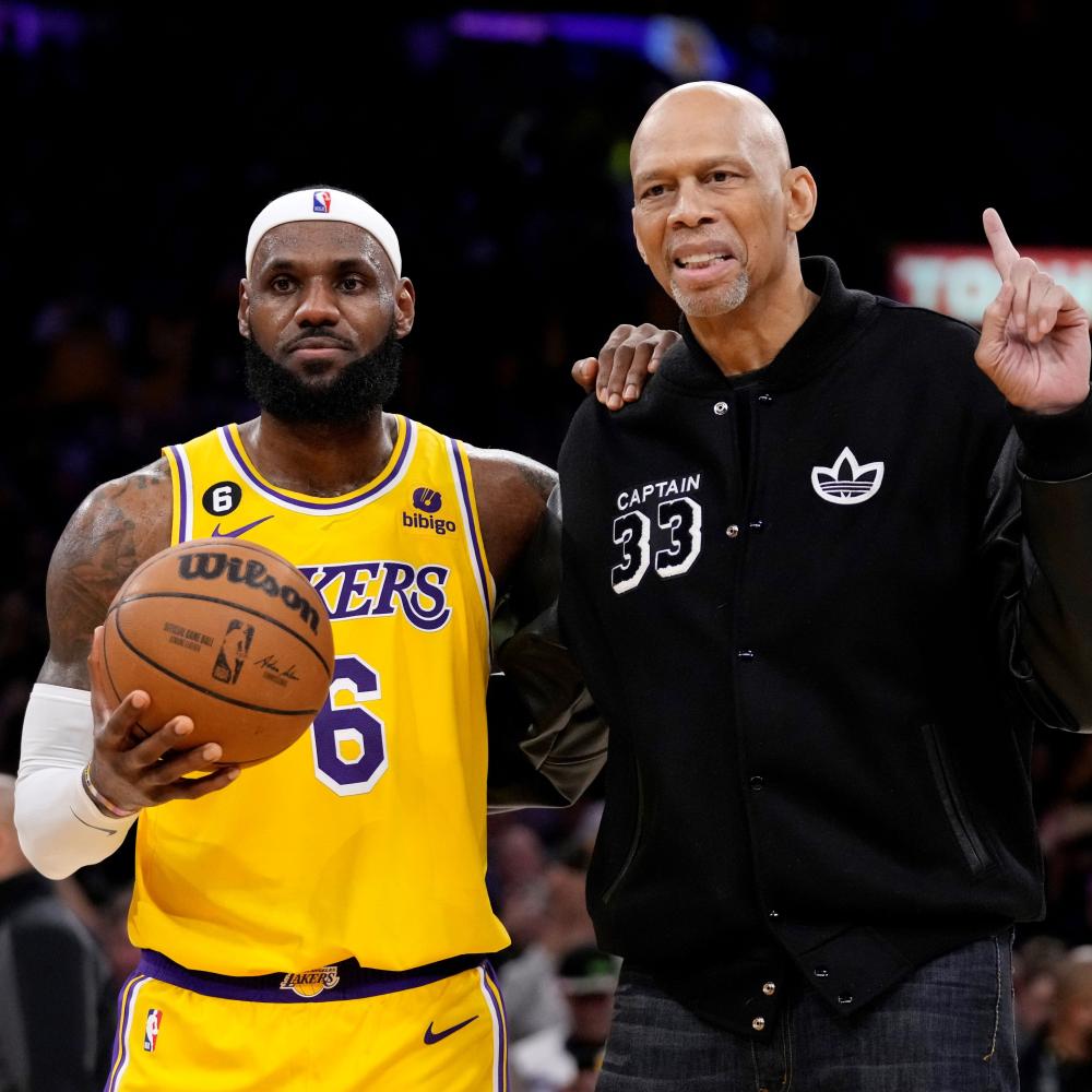 LeBron James and Kareem Abdul-Jabbar pose for photo.