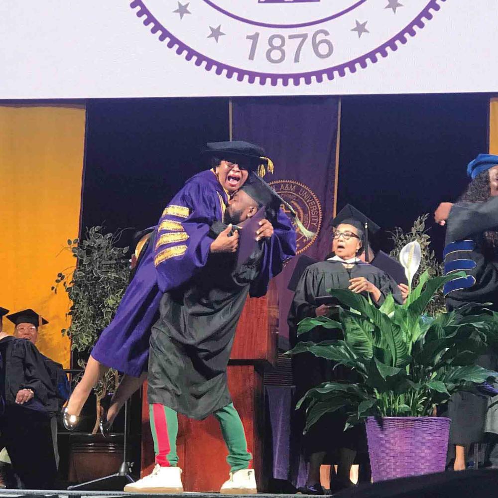 A graduation hug from an appreciative student