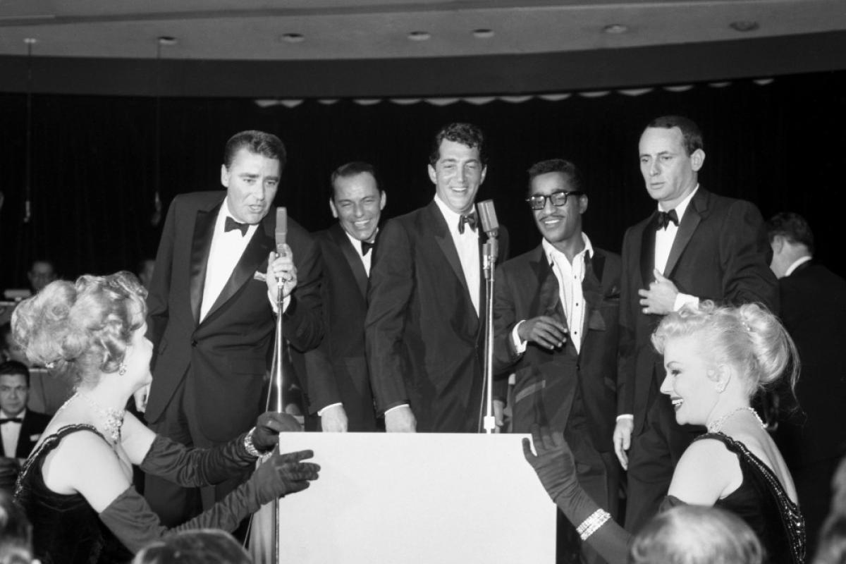 Peter Lawford, Frank Sinatra, Dean Martin, Sammy Davis Jr. and Joey Bishop perform